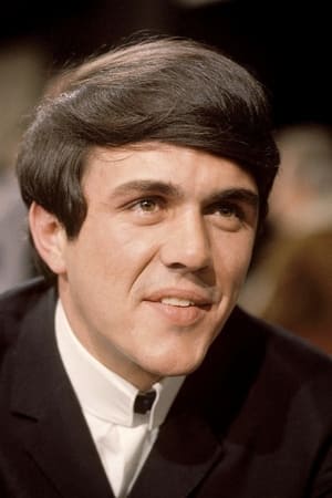 Dave Clark interpretando a Pet Shop Manager