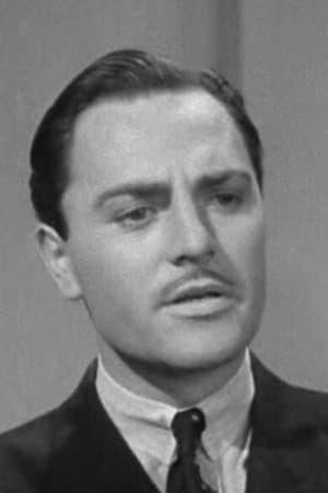 Larry Williams interpretando a Mr. Glover