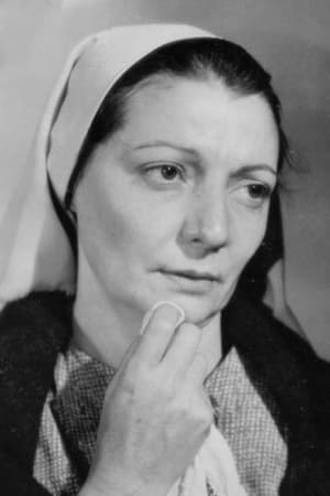 Nan Boardman interpretando a Mrs. Gomez (Uncredited)