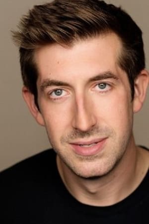 Patrick Warner interpretando a Brian May