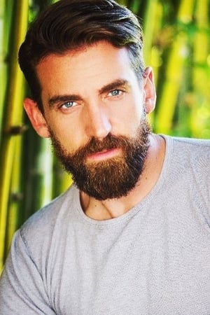 Richard Rennie interpretando a Oliver