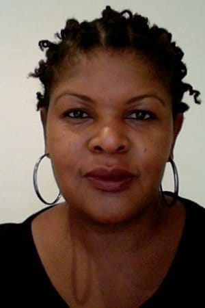 Warona Seane interpretando a Dean Karen Richards