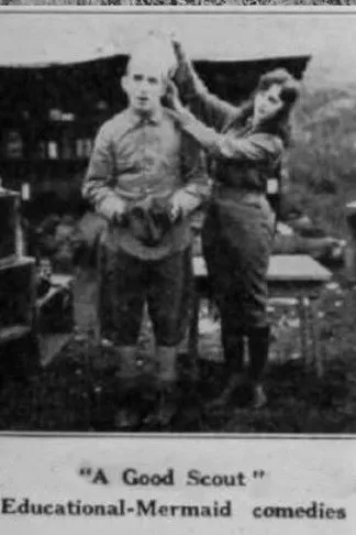 Jimmie Adams interpreta a The Book Agent en A Good Scout