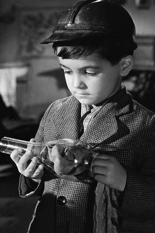 János Dömsödi interpreta a  en Az óriás