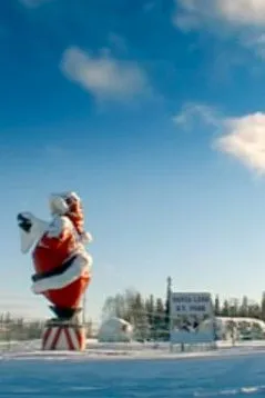 Jon Ronson interpreta a Presenter en Death in Santaland