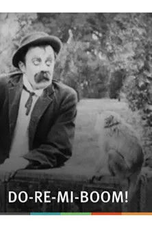 Harry Booker interpreta a Tuneful Tony - the Organ Grinder en Do-Re-Mi-Boom!