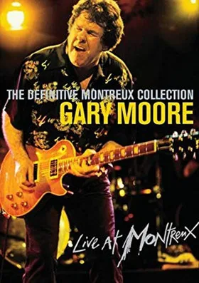 Gary Husband interpreta a Drums en Gary Moore: Live at Montreux 1997