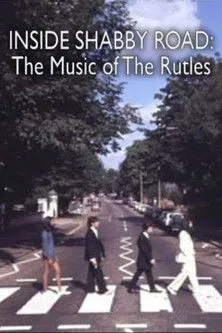 Neil Innes interpreta a Self en Inside Shabby Road: The Music of 'The Rutles'