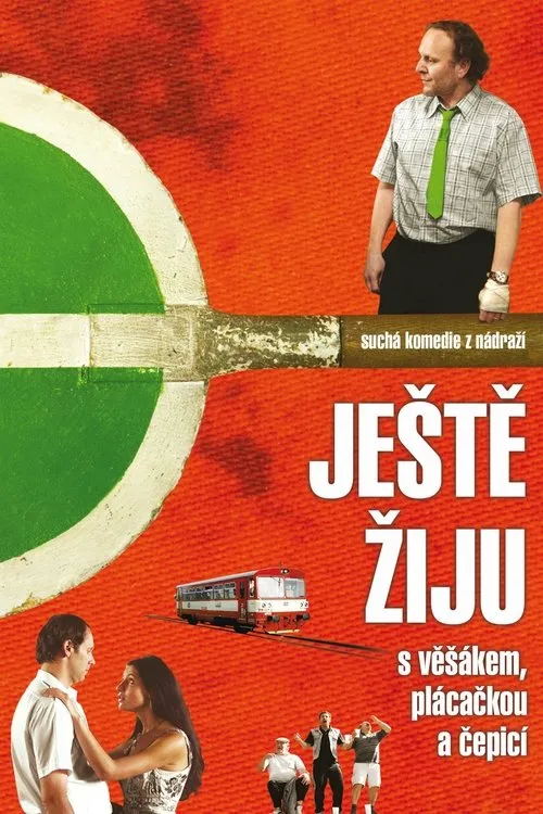 Jaroslav Dušek interpreta a en Ještě žiju s věšákem, čepicí a plácačkou