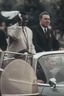 José Eduardo dos Santos interpreta a Self en Наша Африка