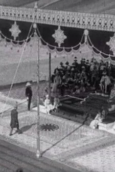 King George V of the United Kingdom interpreta a  en Our King Emperor and Queen Empress Hold a Durbar in Delhi
