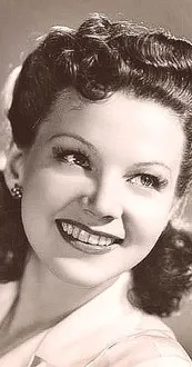 Kaye Dowd interpreta a Hostess en She's a Sweetheart