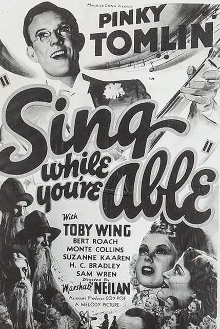 Toby Wing interpreta a Joan Williams en Sing While You're Able