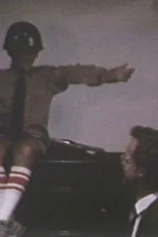 Tony Conrad interpreta a  en Teddy Tells Jokes