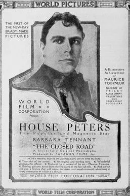 Lionel Adams interpreta a Dr. Hugh Annersley en The Closed Road