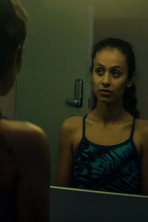 Theresa Godly interpreta a Coach Harris en Torr