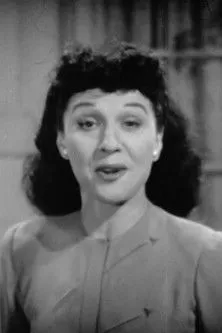 Toni Lane interpreta a Vocalist en When Hitler Kicks the Bucket